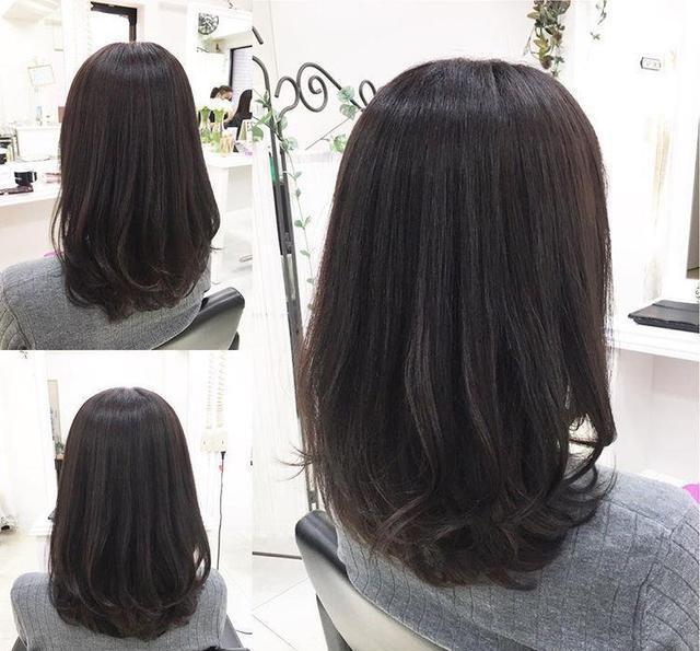 烫发尾的长发发型今年最流行