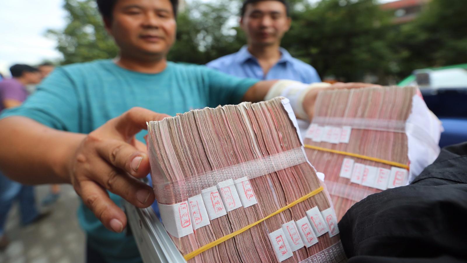 的哥捡20万现金物归原主 这种钱不能起邪念