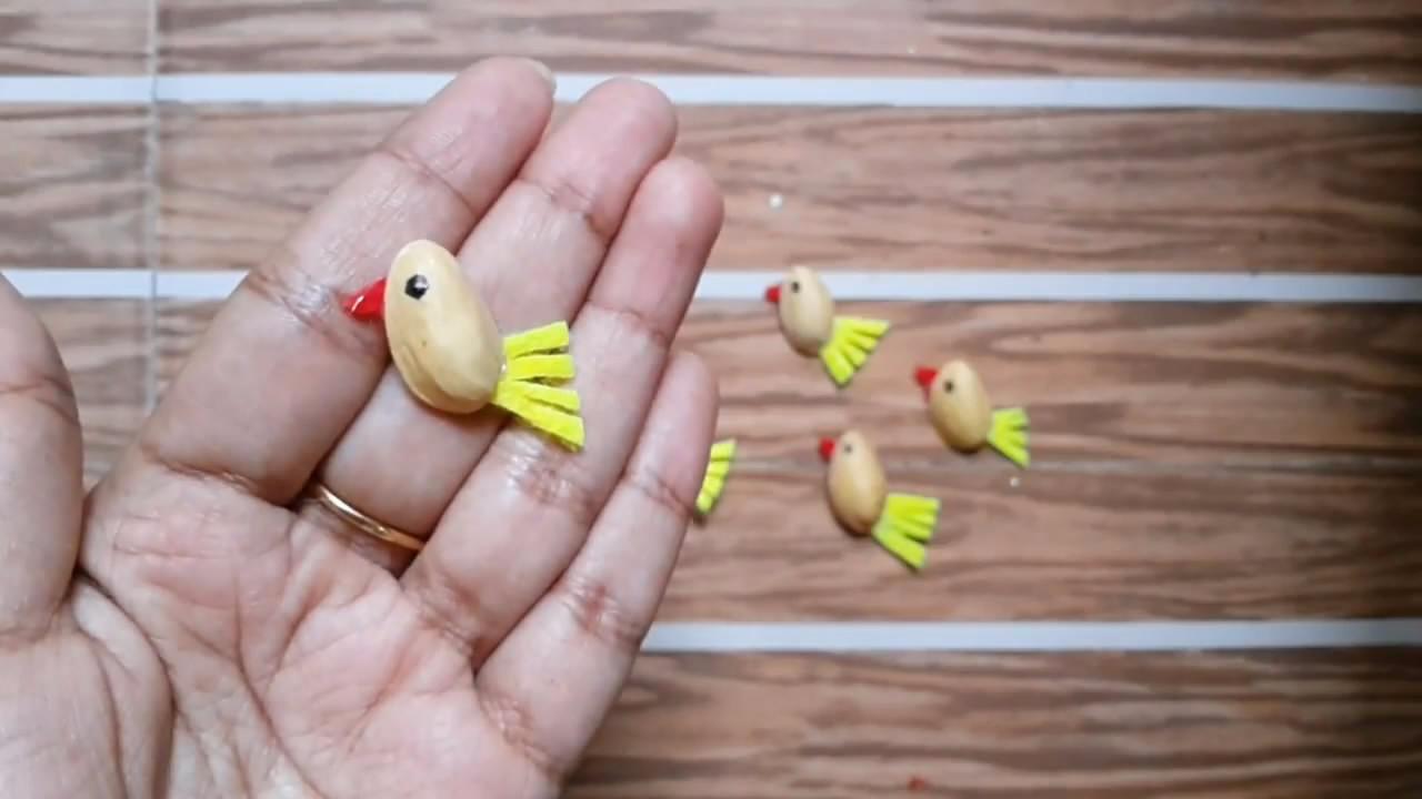 创意手工diy,教你用开心果壳制作"小鸟"的方法,很新颖