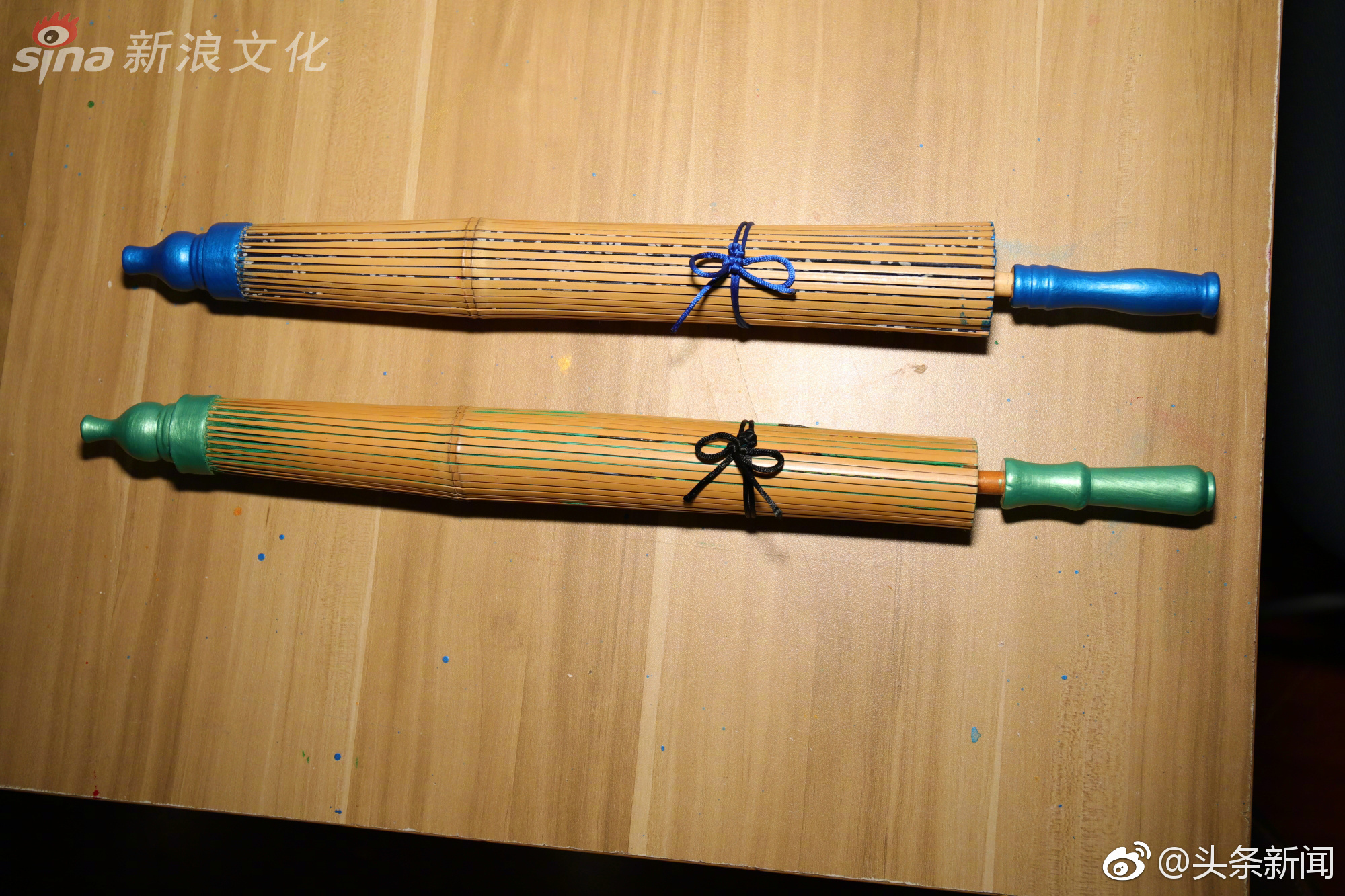 撑开为伞收拢为竹 揭秘高颜值的西湖绸伞|西湖|绸伞|宋志明_新浪新闻