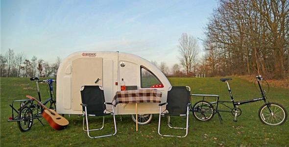 外出骑行游玩时,可以勾挂在自行车后面的迷你小房车