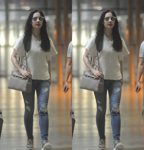 其实看看刘亦菲的机场照就知道刘亦菲有多重了,刘亦菲从来不弄机场秀