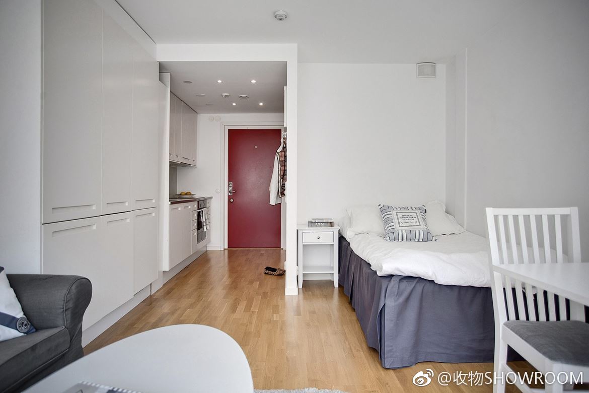 单身公寓25平方米生活区没有花纹的浅色调很显大