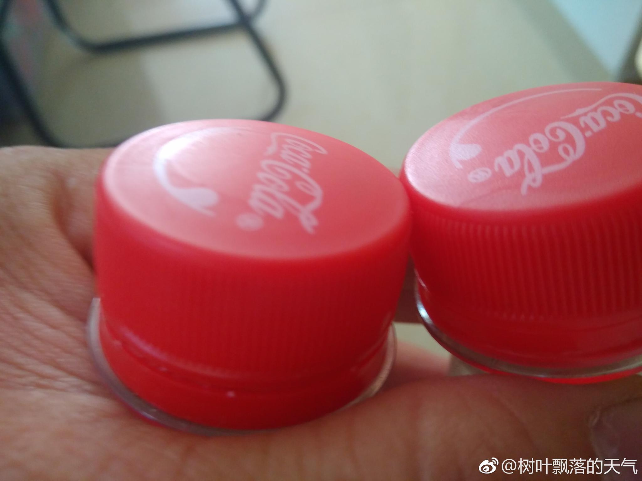 区分真假可乐最近市面上出现了假的可口可乐口感为糖精味