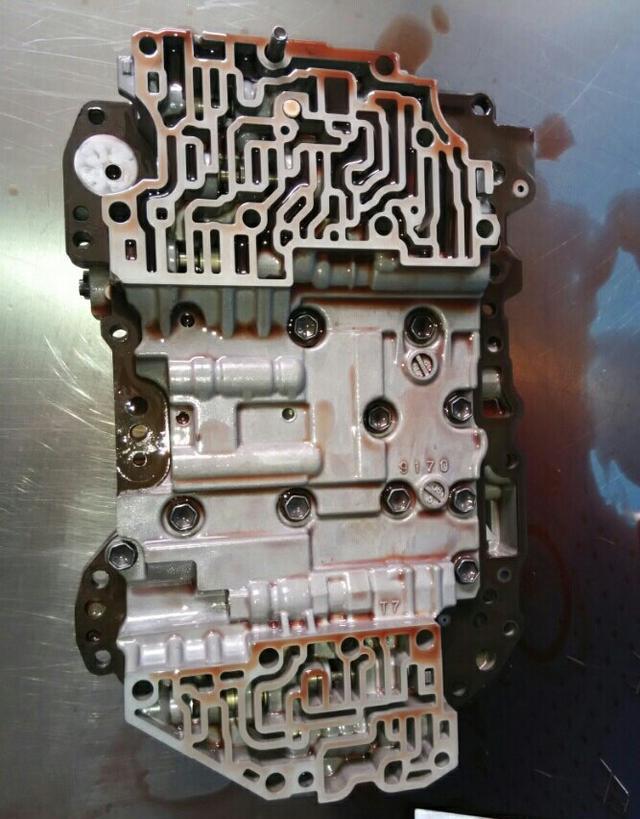 图7图8图 9三,故障处理方法:更换新的09g自动变速箱滑阀箱,问题解决.