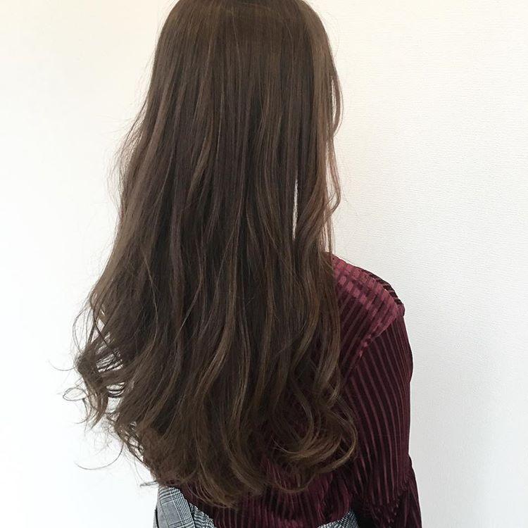 留长发,微卷的发型今年最流行