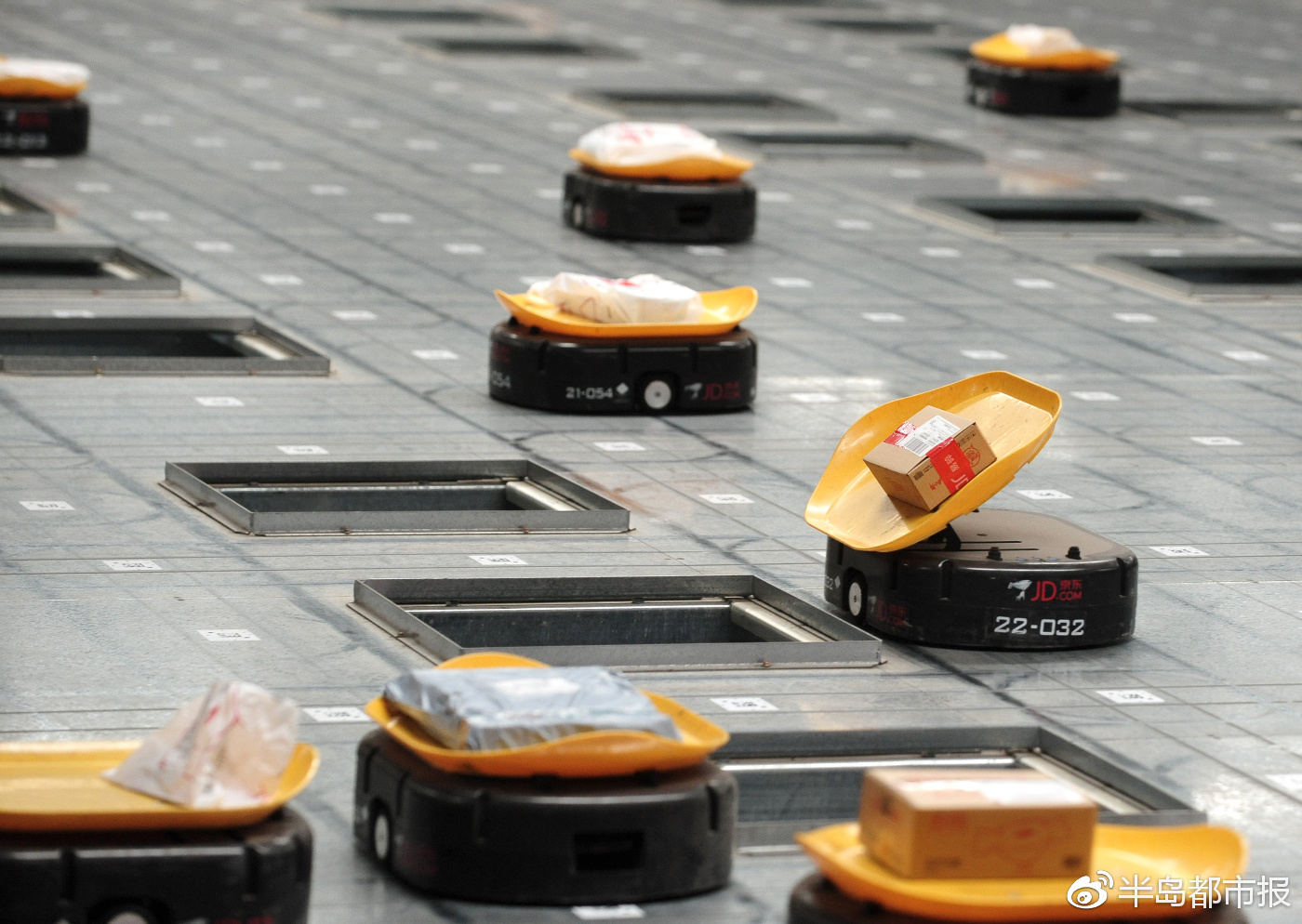 这个618购物节,给你分拣包裹的可能不是"人"__财经头条