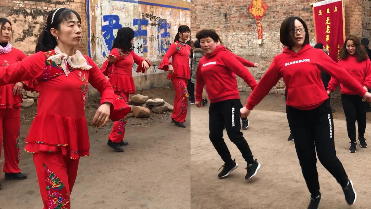 农村大妈和小媳妇们斗舞,小媳妇队围观者多