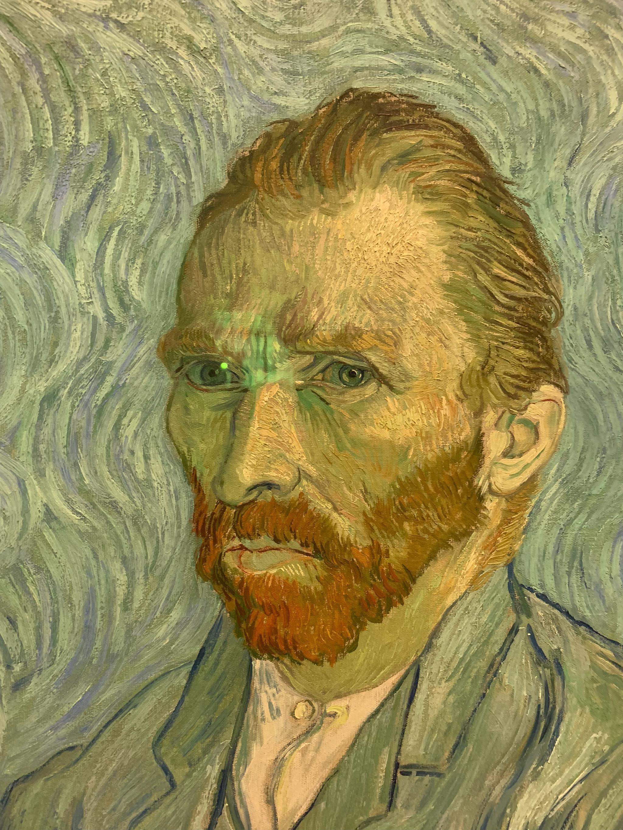 梵高自画像原作实拍,图一颜色基本还原原作,细节图有误差