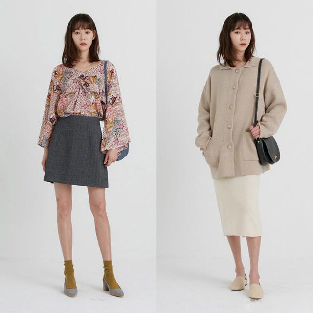 小风衣简单的裁剪很有现代简约的风格,与西装阔腿裤的搭配在都市女性