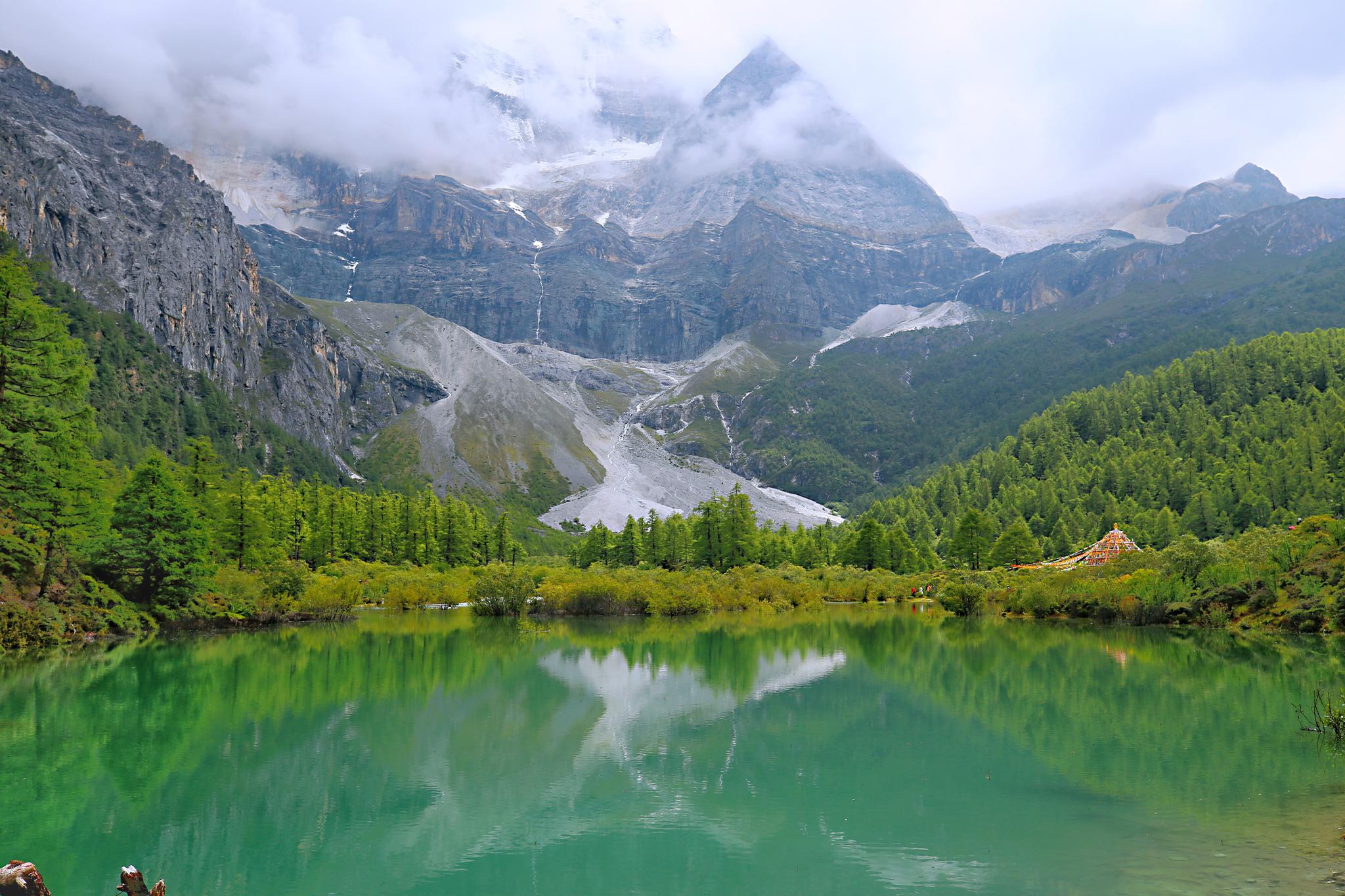 有一个地方叫做稻城亚丁,没去过的人因它而流浪