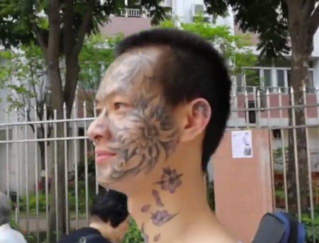 28岁男子满脸刺青图片