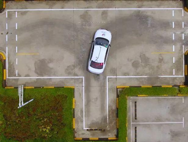 科目二挂科之倒车入库方向盘打晚了如何补救?