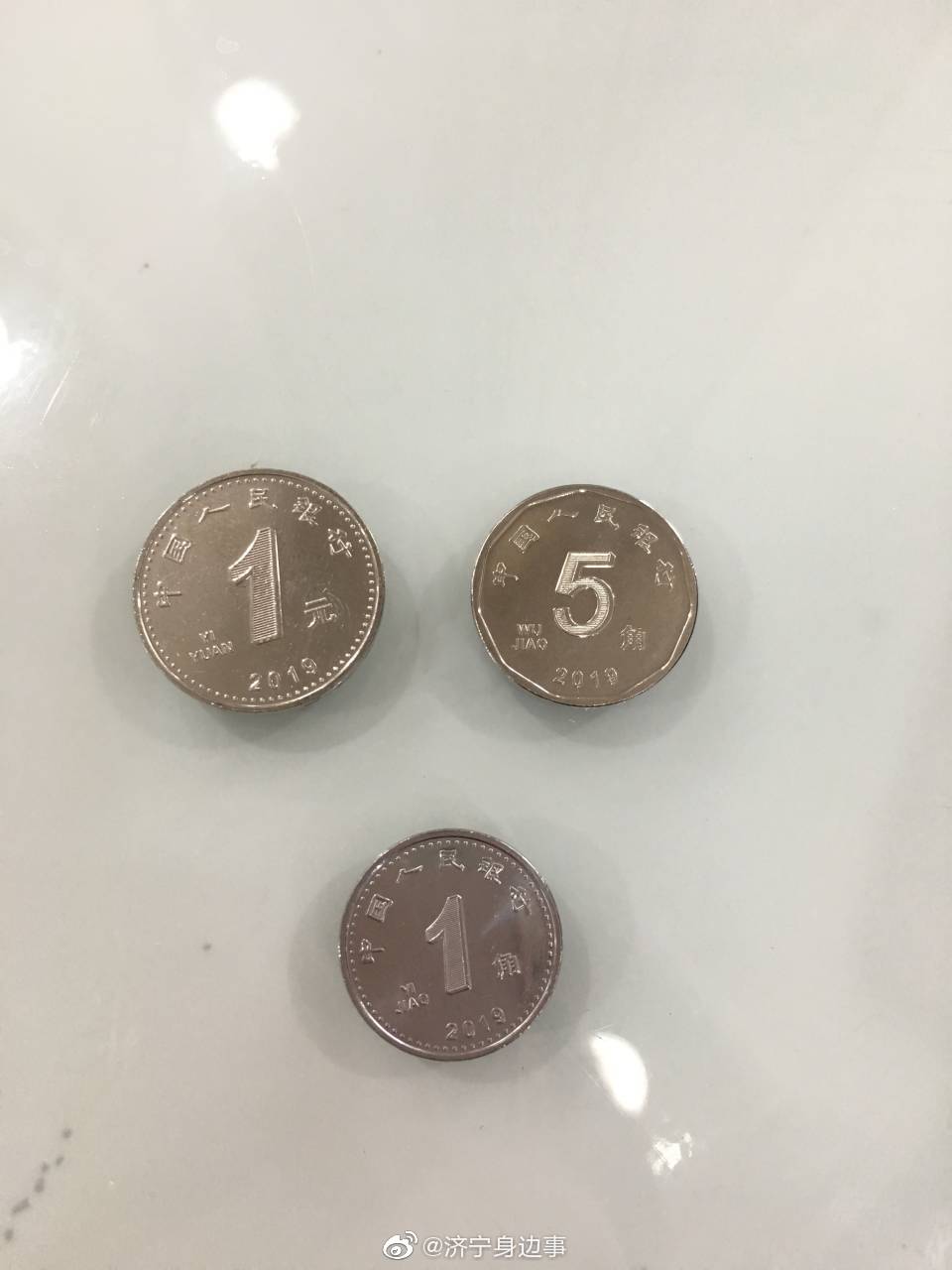 新版人民币在济宁投放 5角硬币变镍白色