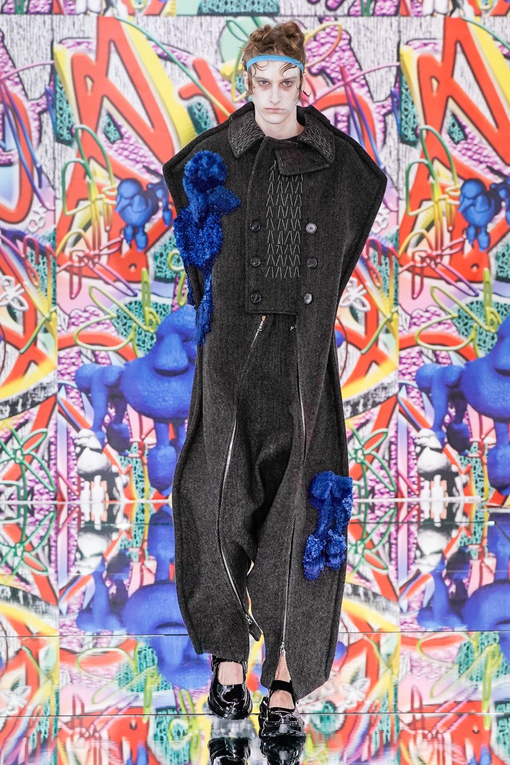 马丁马吉拉martinmargiela是一位以解构主义设计风格而闻名的服