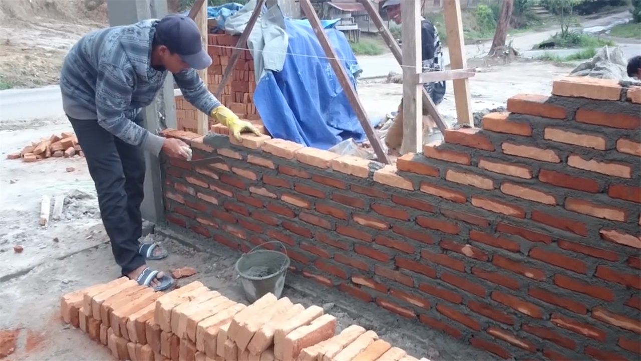 效率不是一般的高美国发明砌砖机器人一天能建一栋房子