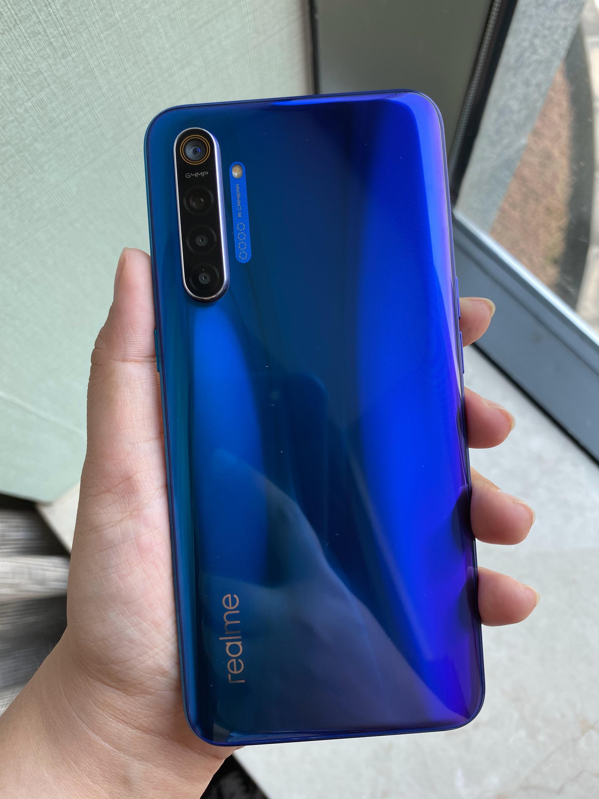 realmex2星图蓝真机实拍64英寸superamoled水滴屏