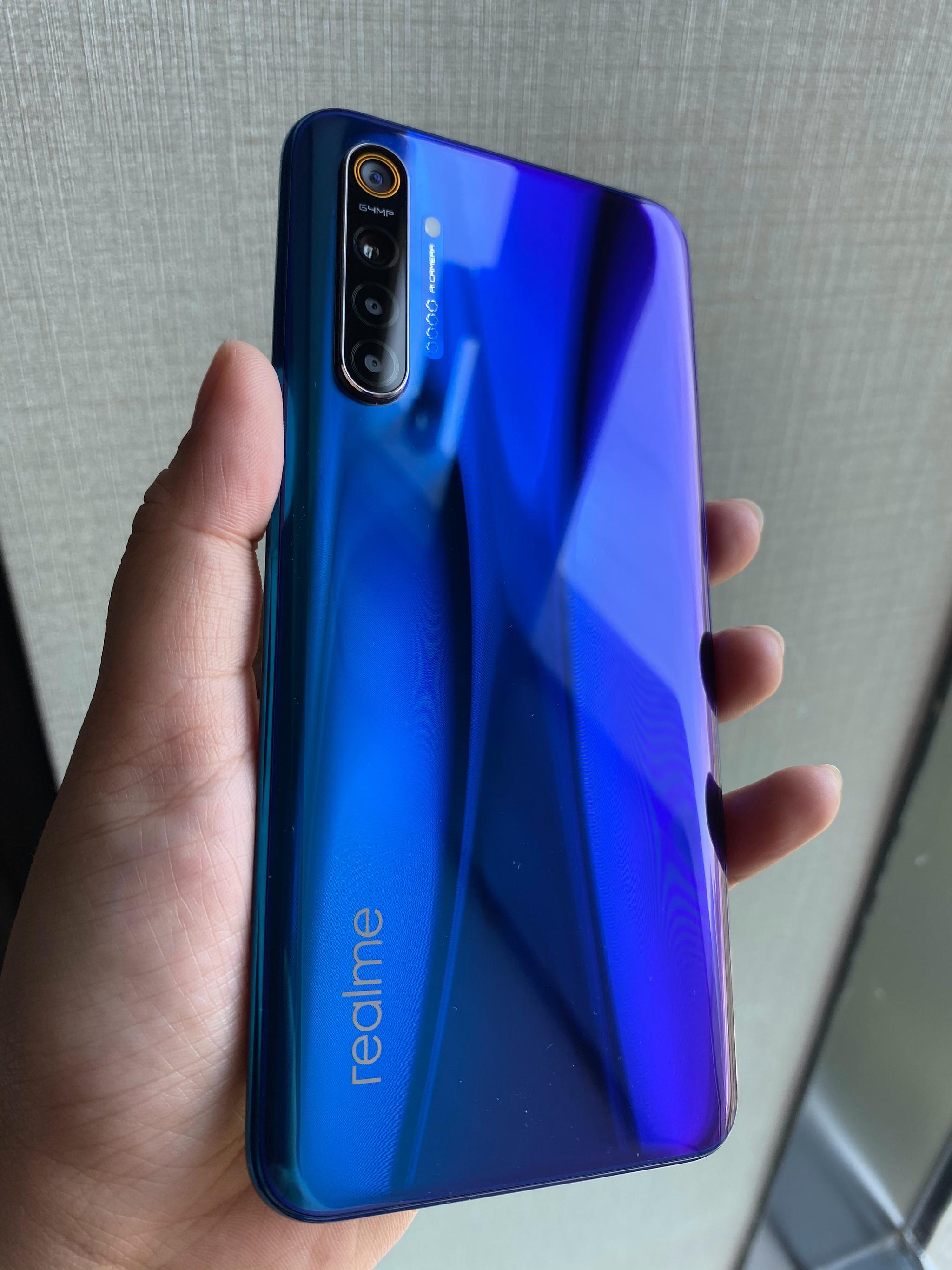 realmex2星图蓝真机实拍64英寸superamoled水滴屏