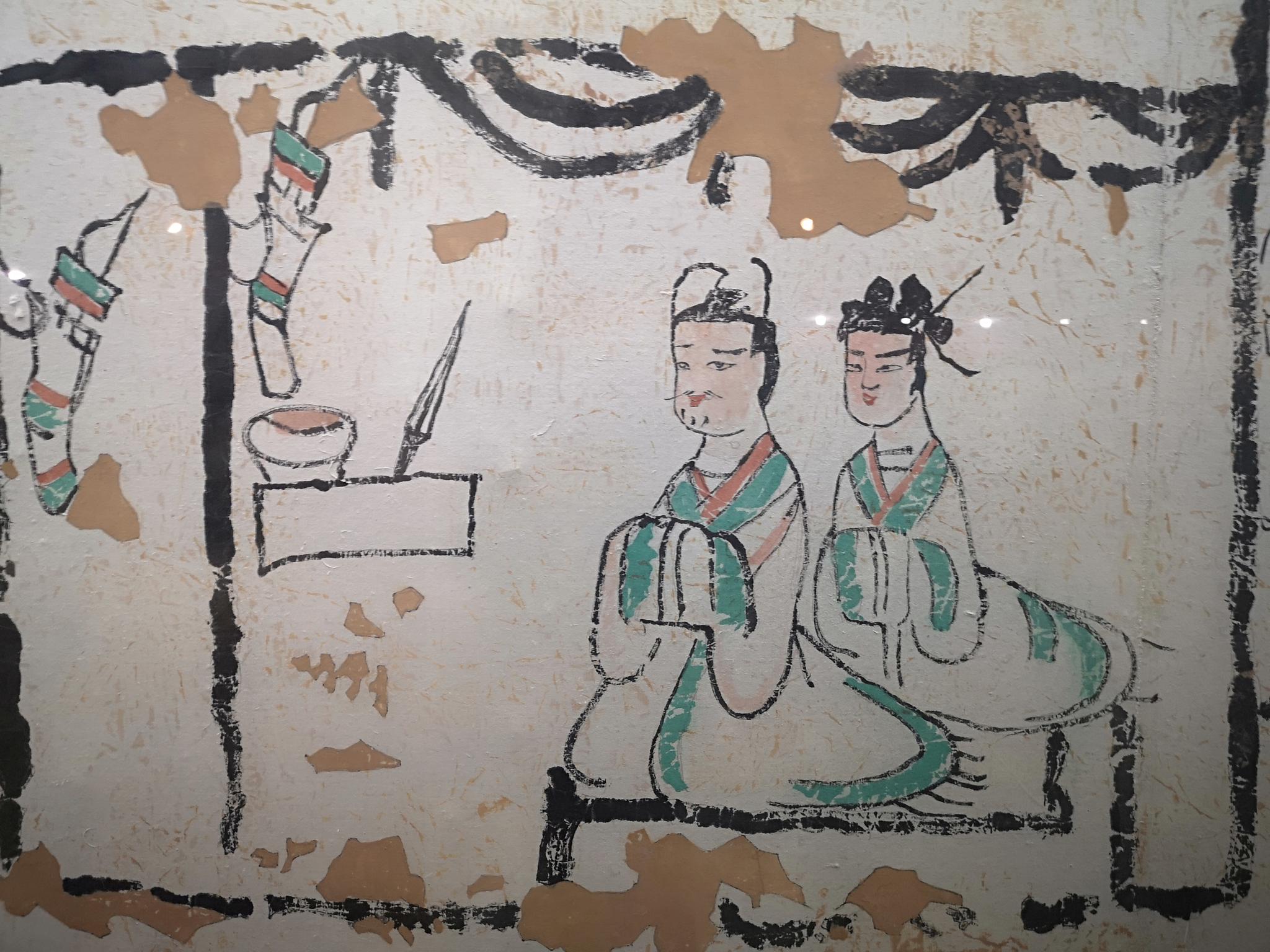 吐鲁番阿斯塔纳古墓群出土的魏晋时期田园生活图画工拙朴