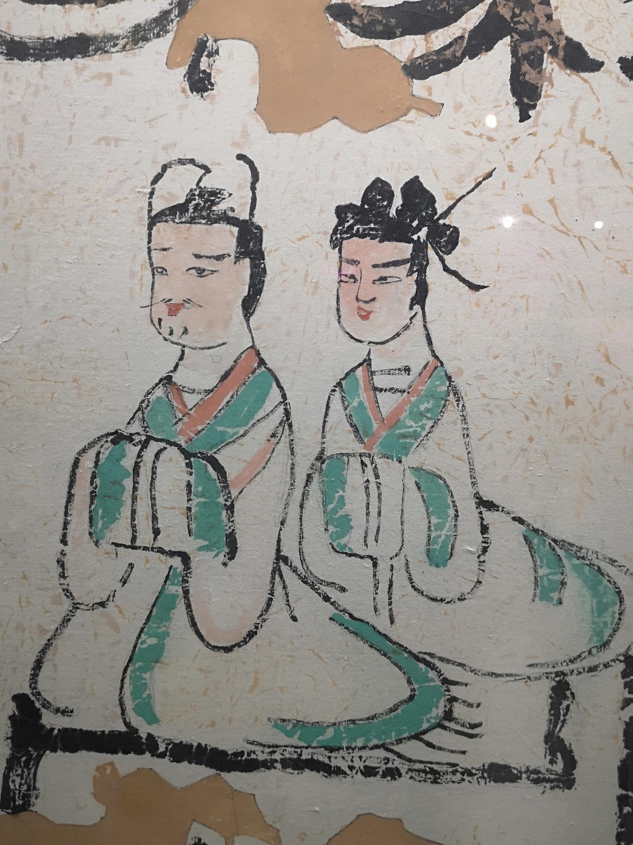 吐鲁番阿斯塔纳古墓群出土的魏晋时期田园生活图画工拙朴