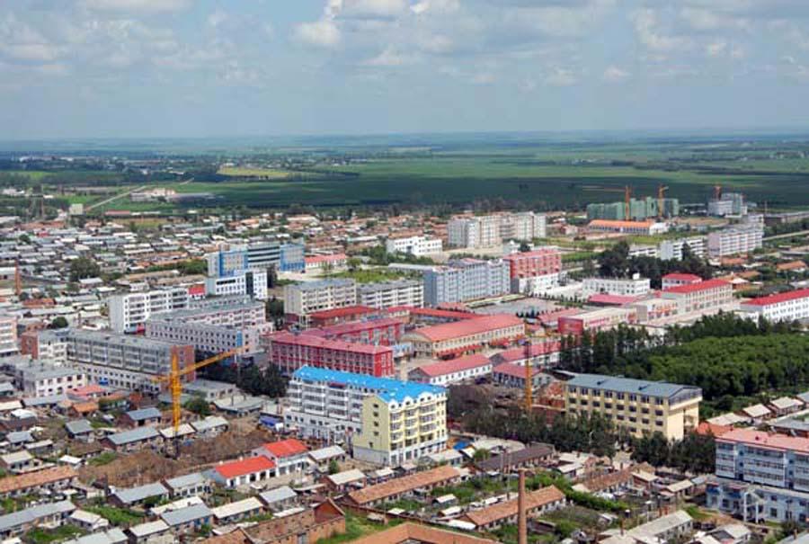 黑龙江黑河北安市一个大镇, 和克东县接壤, 是全国重点镇|大豆|赵光镇