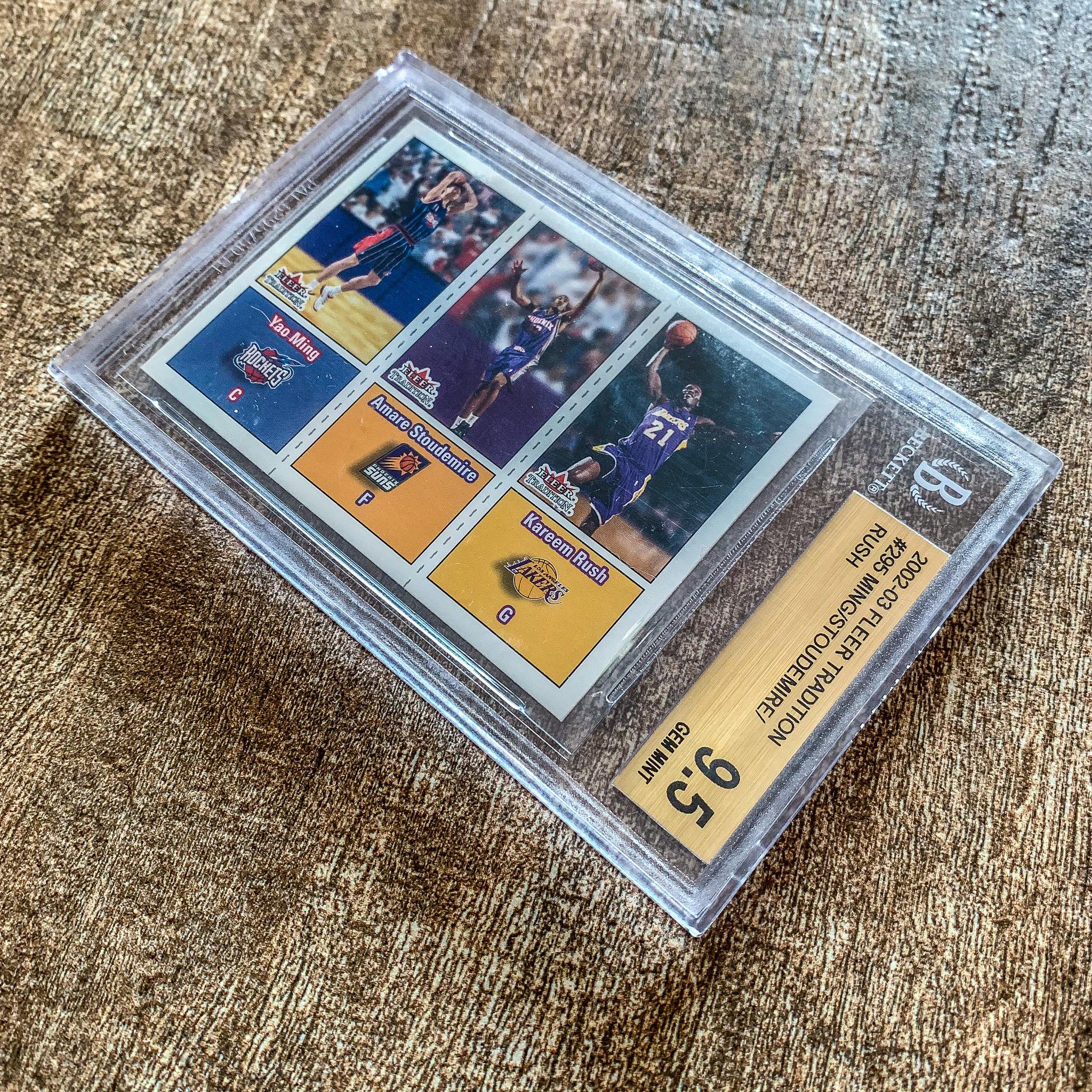 找出来一张2002年的fleer球星卡