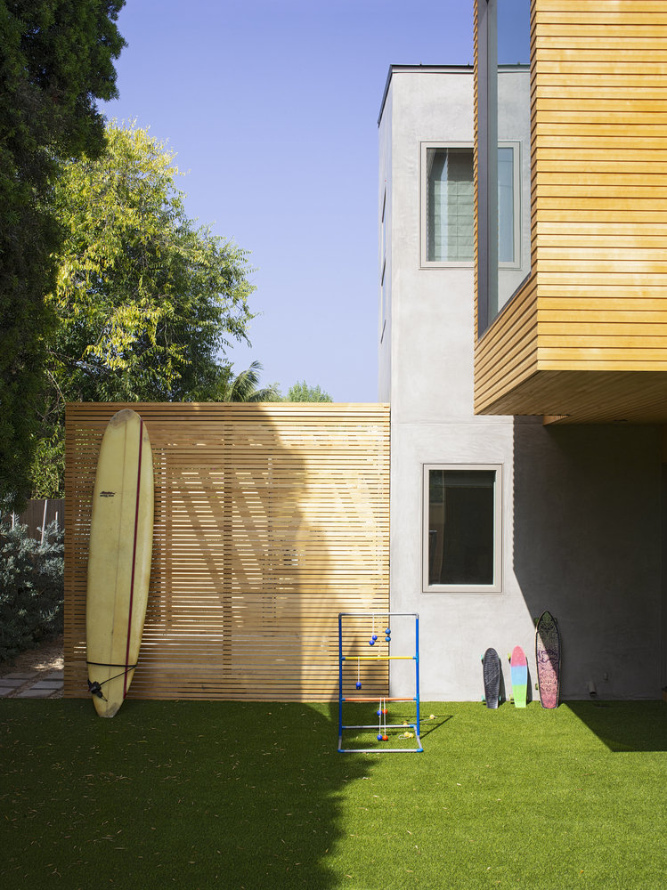 曼哈顿海滩避暑别墅bluetruckstudio业主一家对他们别墅所处的海