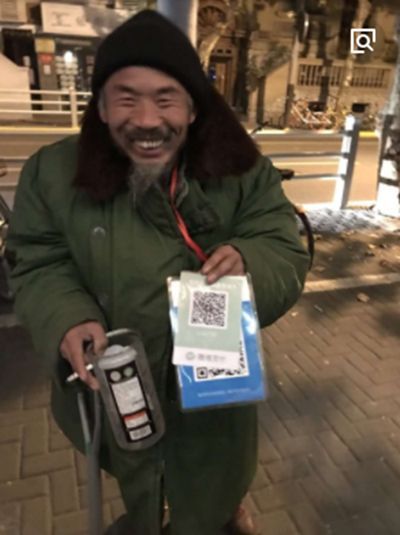 连叫化子乞讨都用二维码收钱了!今天,阿拉上海又喜提排名第一了!