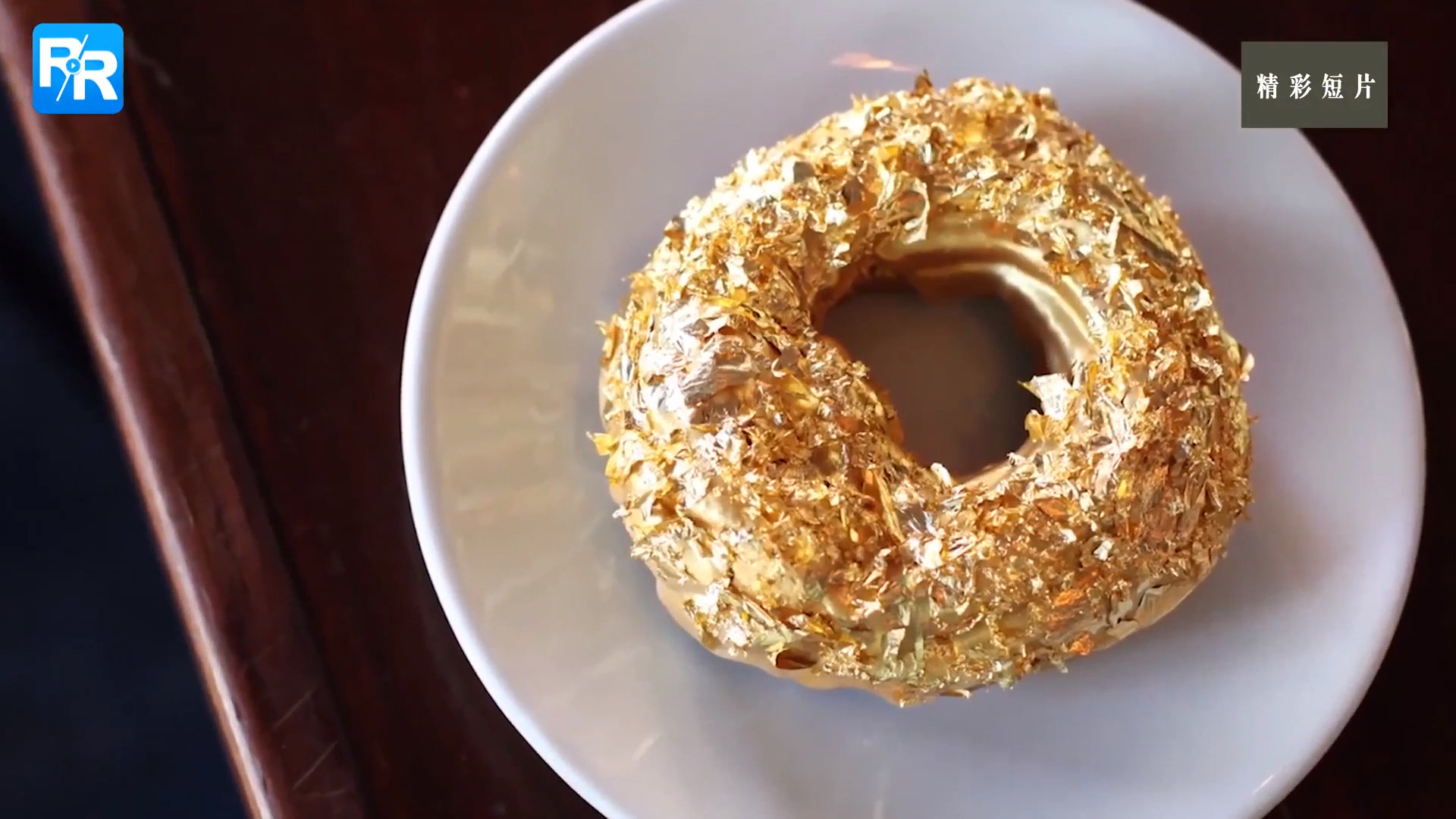 100美元一个金箔豪华甜甜圈!咬一口满嘴美元味道!