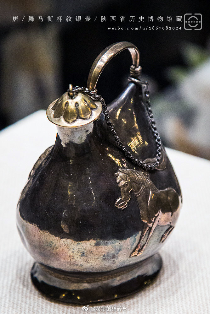大唐舞马衔杯纹银壶