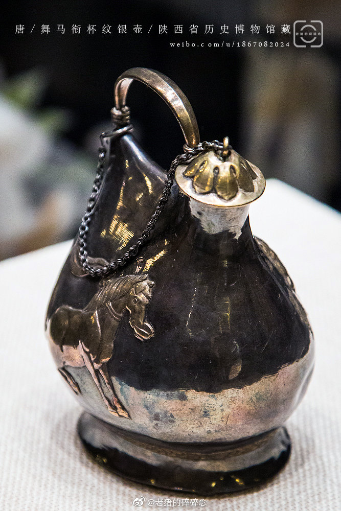 大唐舞马衔杯纹银壶