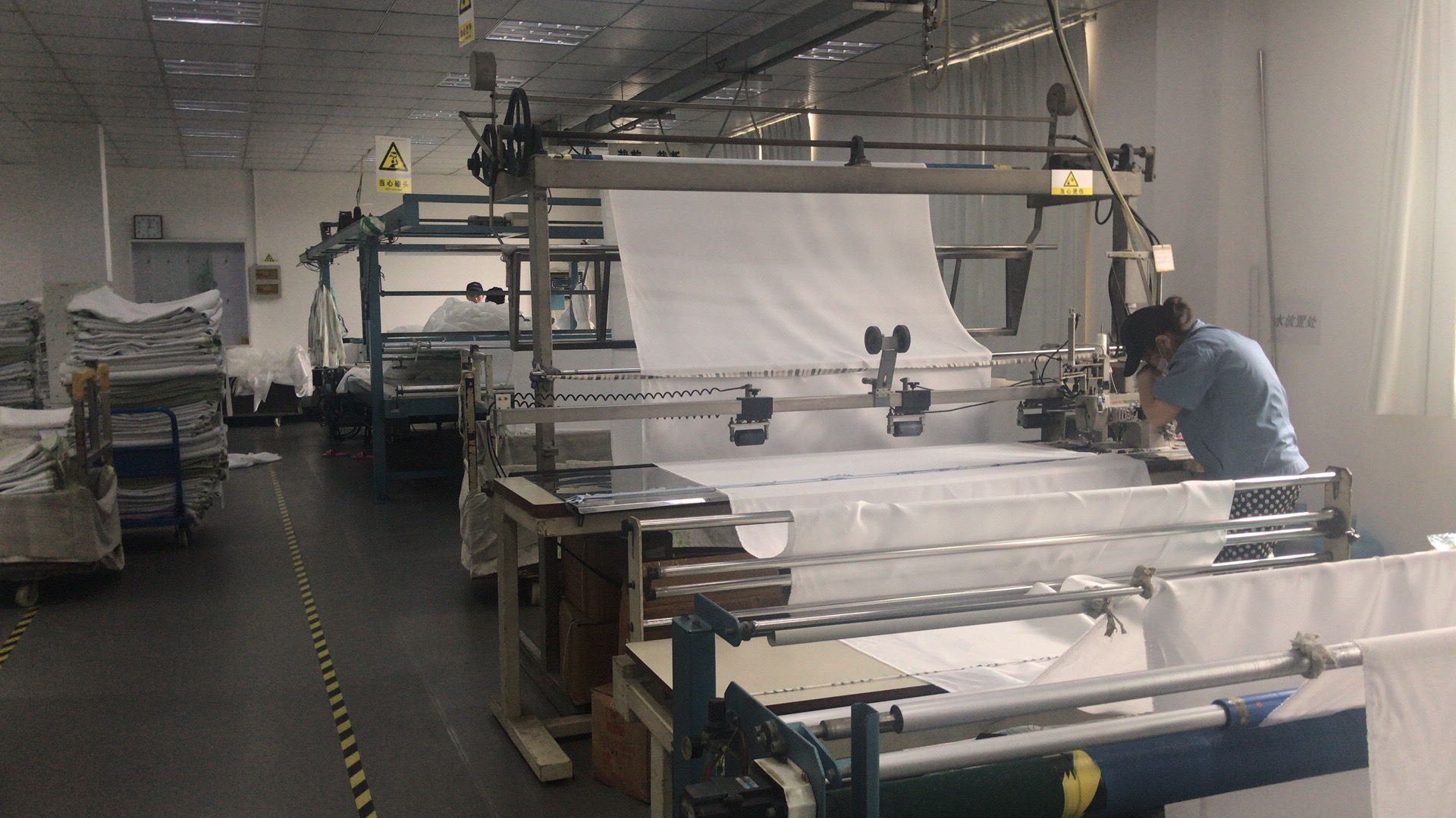 考察日资窗帘加工厂再好的进口面料也需要在加工厂里做加工