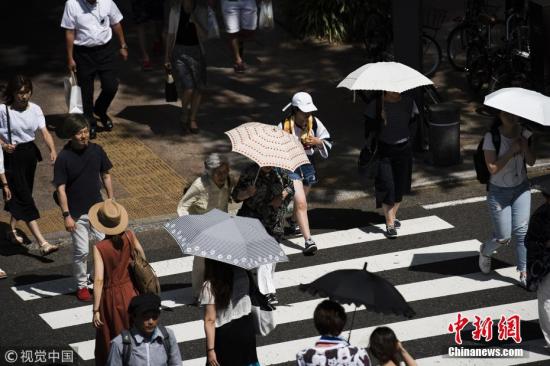 资料图：高温天气下的日本街头。