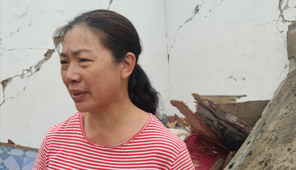 地震发生后，李氏兄弟的邻居马桂英参与救人。