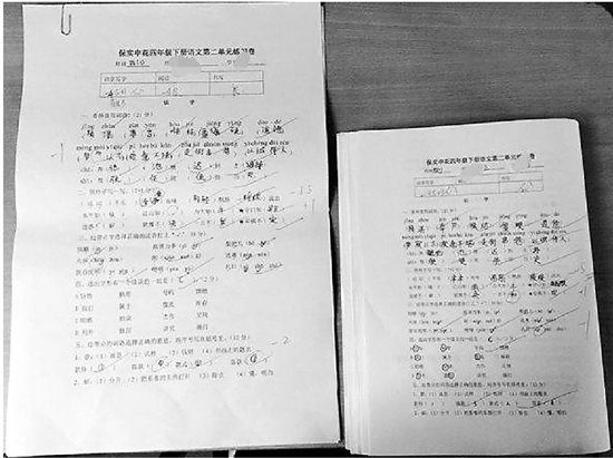 放大了一倍的試卷和正常的試卷。 本文圖片 錢江晚報