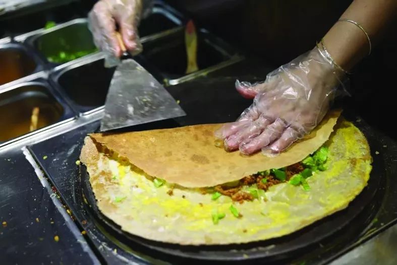 煎饼摊小食杂店现场制售不会消失