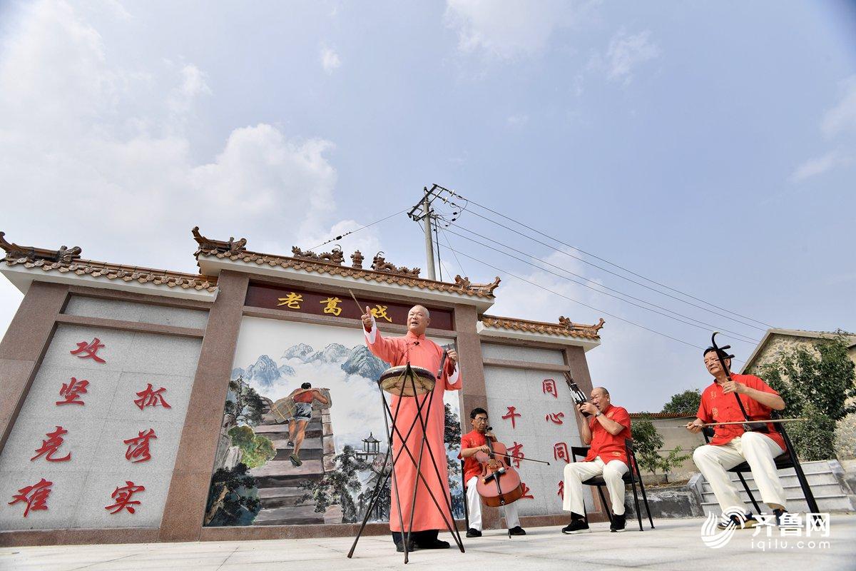 泰安北张村的蝶变之路3000平米墙绘书就花田北张