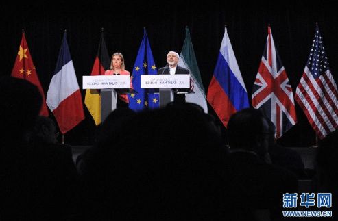  ▲资料图片：2015年7月14日，欧盟外交与安全政策高级代表莫盖里尼和伊朗外长扎里夫在奥地利维也纳共同宣布伊朗核问题最终协议达成。