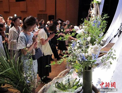 资料图：当地时间2017年7月27日，日本神奈川县在相模湖交流中心举行追悼会，悼念二战时期死难的韩国等国劳工。中新社发 王健 摄