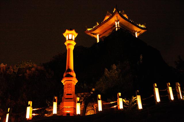 除了古井城墙,杨受成父亲出资重建的北阁佛灯