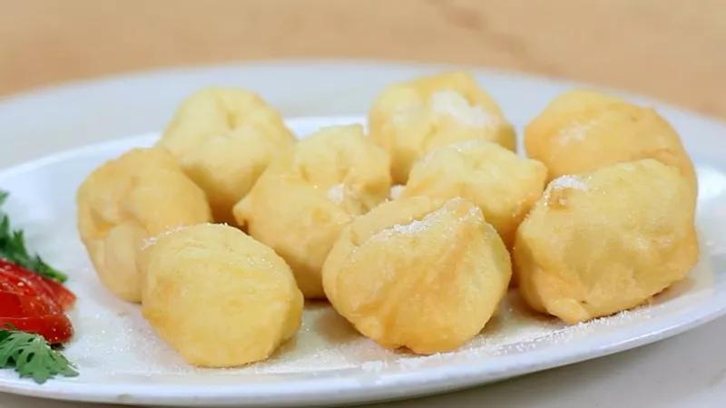 台州临海特色美食"蛋清羊尾",色泽嫩黄,酷似羊尾,油而不腻