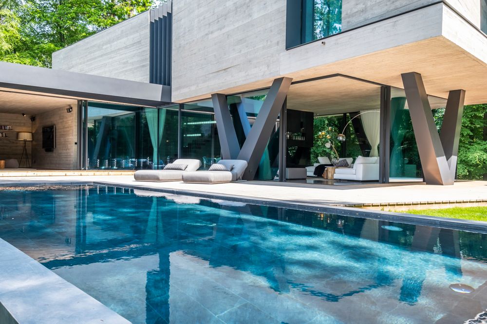 混凝土+石材+玻璃，打造新时代“奢华”别墅，比金碧辉煌更舒适