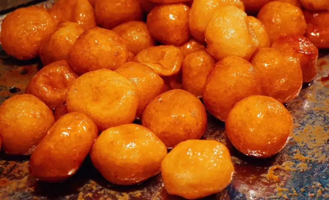 糖油粑粑,是长沙小孩子新年最为期盼的甜食!