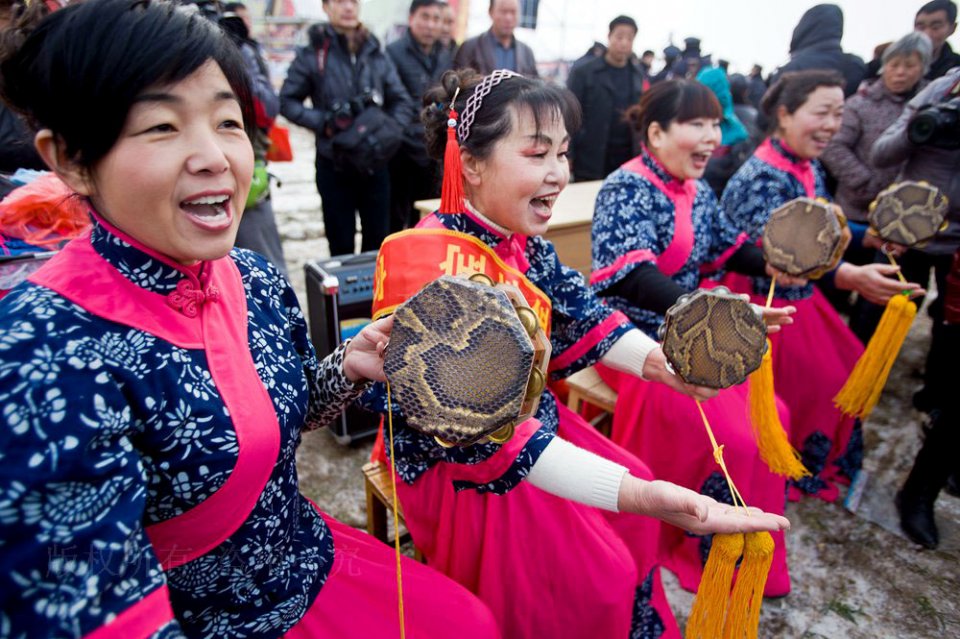 满族乐器蒙着蟒蛇皮的八角鼓是戏曲票友票房的来历