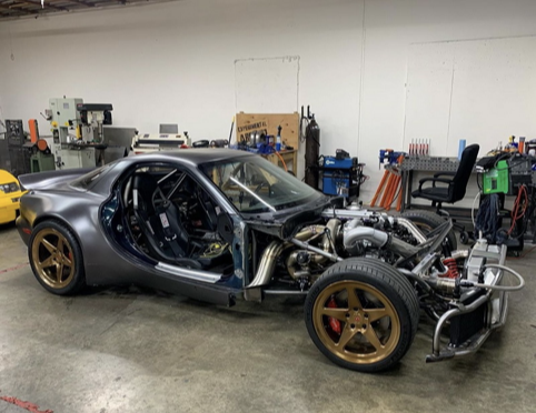 马自达rx 7全球第一辆四转子改装车 涡轮比头还大 新浪汽车