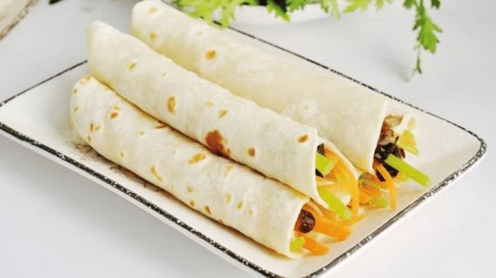 家常菜烧油豆腐春饼香菇炒菜心意式番茄培根炖饭的做法