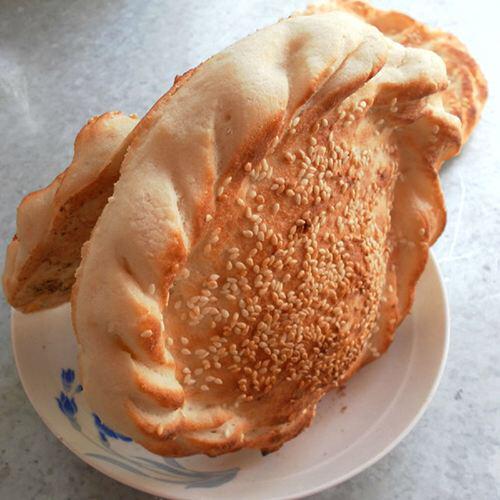 又大又圆的烧饼有着我对儿时的回忆,有着我对儿时的眷恋.