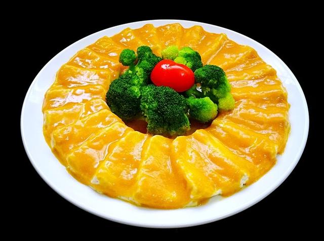 南瓜黄金豆腐,鲜嫩的豆腐配上黄澄澄的南瓜汁,吃起来特别爽