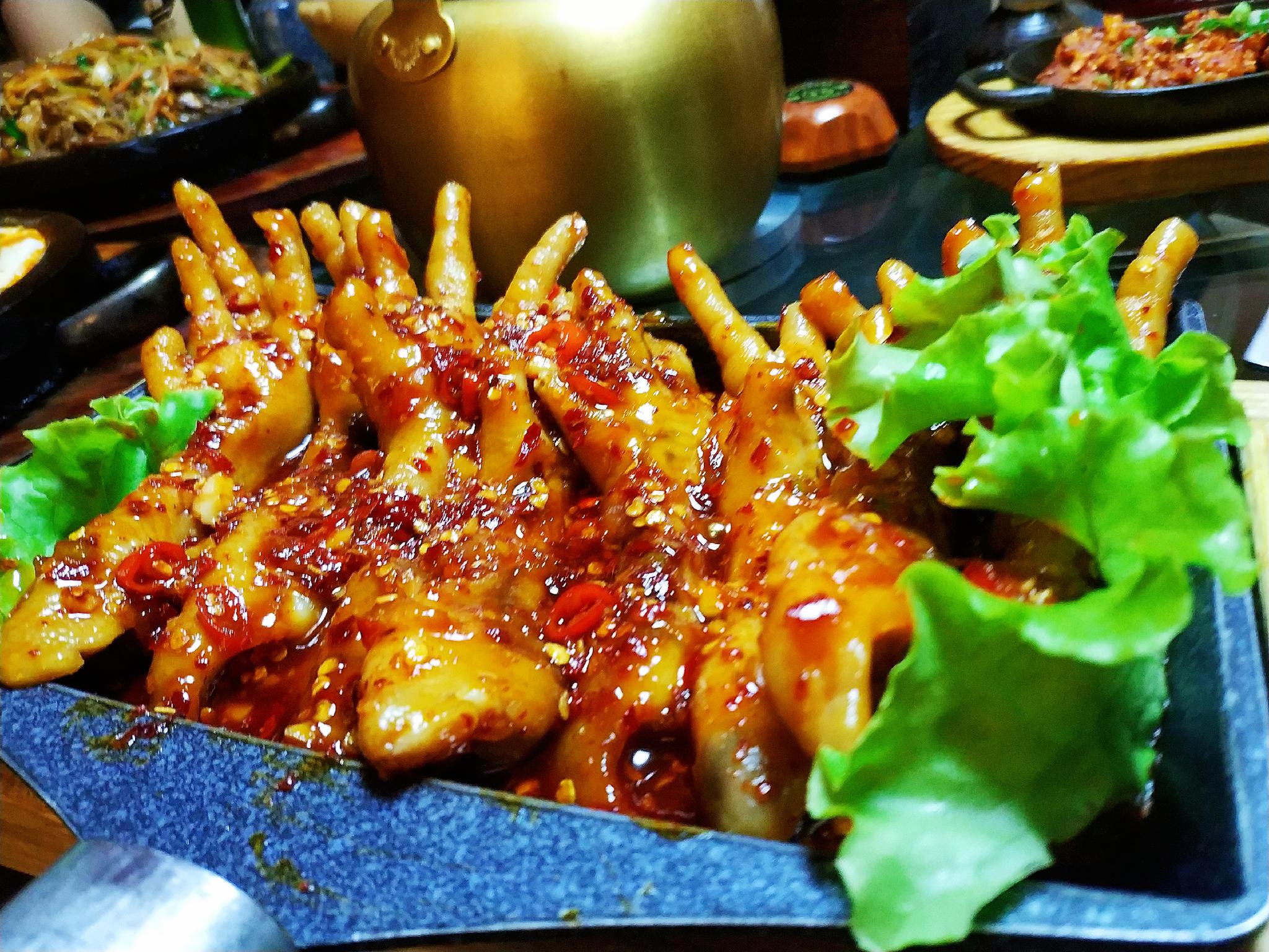 长春大街与大经路交会东行200米最强韩餐延边小木屋火辣鸡爪