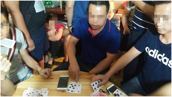 18人藏身酒店里赌"三公" 每局庄家"抽水"100至200元